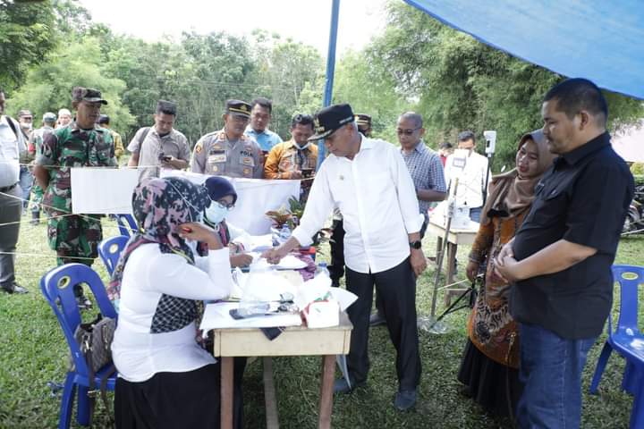 Bupati Asahan Didampingi Camat Buntu Pane Tinjau Pelaksanaan Pilkades