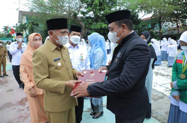 Bupati Asahan Pimpin Upacara Hari Amal Bakti ke-76 Tingkat Kabupaten Asahan