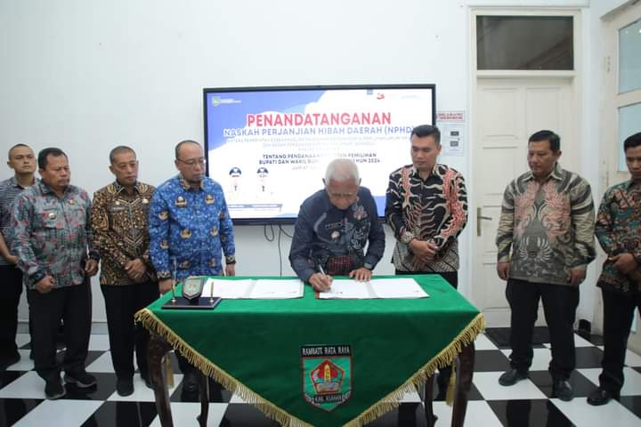 Penandatanganan NPHD Antara Pemerintah Daerah Dengan KPU Kabupaten Asahan
